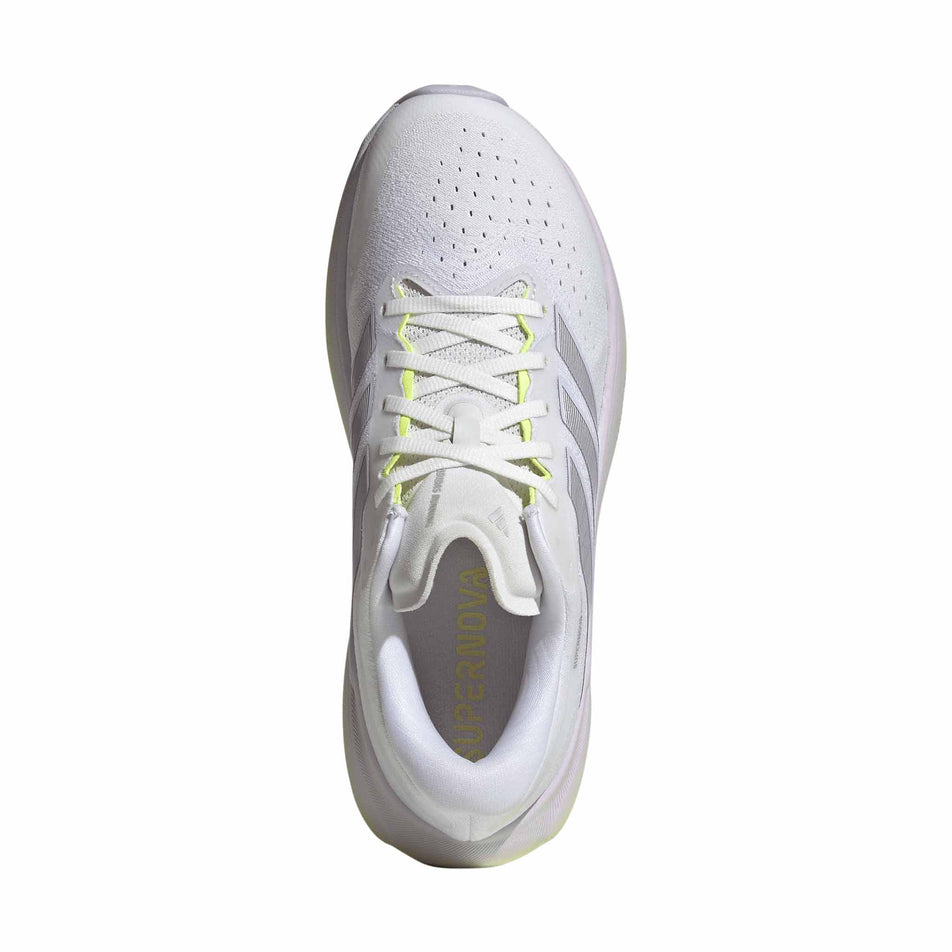 The upper of the right shoe from a pair of adidas Women's Supernova Rise 3 Running Shoes in the Crystal White/Silver Met./Purple Tint colourway.