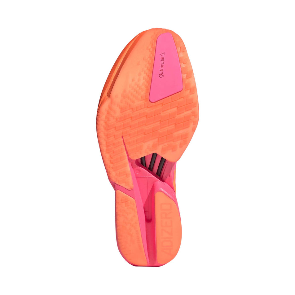 The outsole of the right shoe from a pair of adidas Men's Adizero Adios Pro 4 Running Shoes in the Lucid Pink/Lucid Orange/Iron Met. colourway.