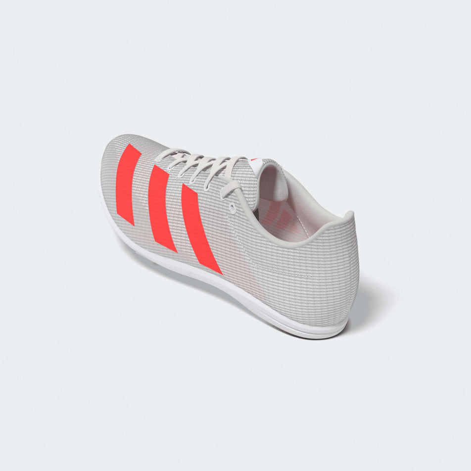 Lateral view of the left shoe from a pair of adidas Junior-Unisex Allroundstar Running Spikes in the Ftwr White/Solar Turbo/Gold Met. colourway.
