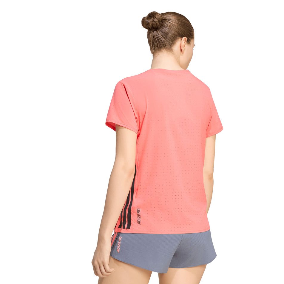 Back view of a model wearing the adidas Women's Adizero Tee in the Semi Turbo colourway.