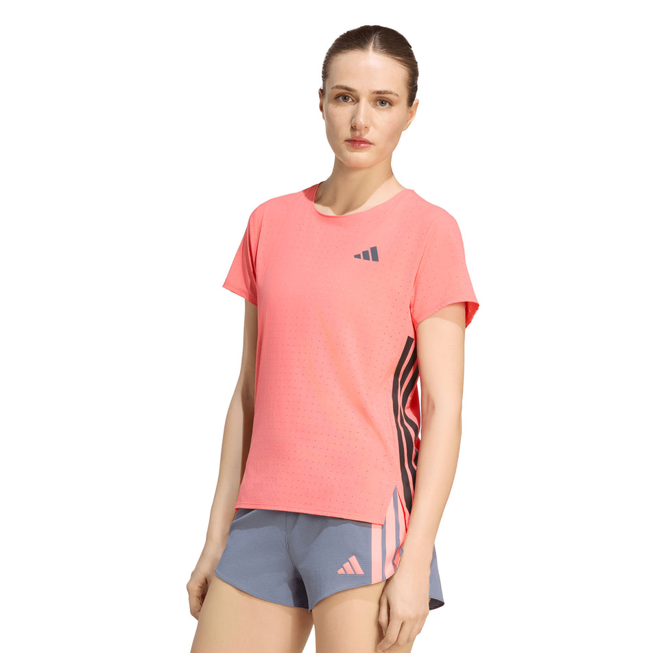 Front view of a model wearing the adidas Women's Adizero Tee in the Semi Turbo colourway.