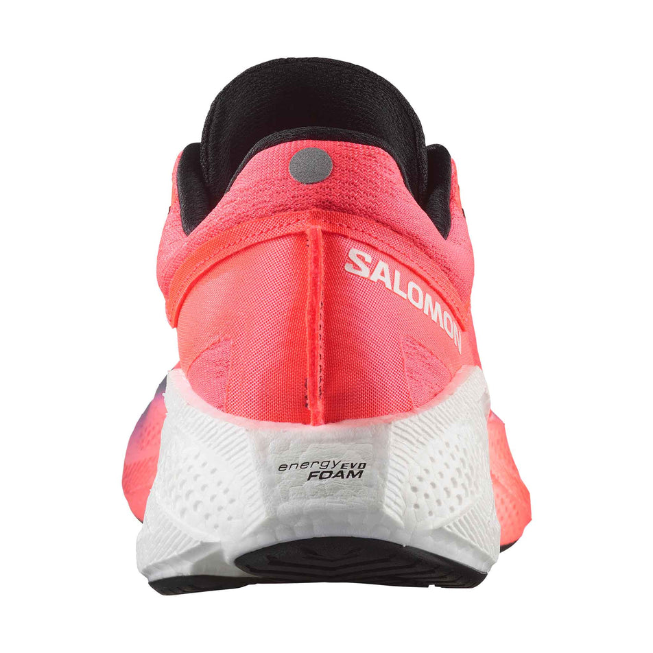 The back of the right shoe from a pair of Salomon Women's Aero Glide 3 Running Shoes in the Neon Flame/White/Black colourway. (8783549956258)