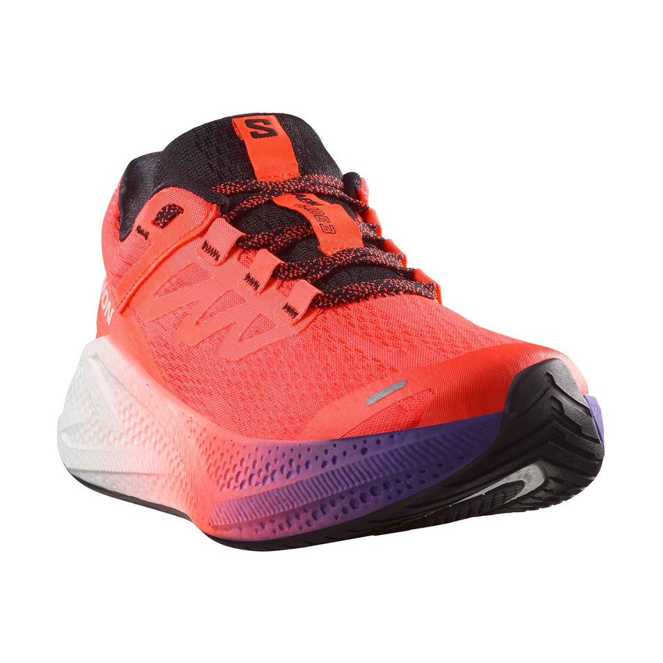 The right shoe from a pair of Salomon Women's Aero Glide 3 Running Shoes in the Neon Flame/White/Black colourway. (8783549956258)