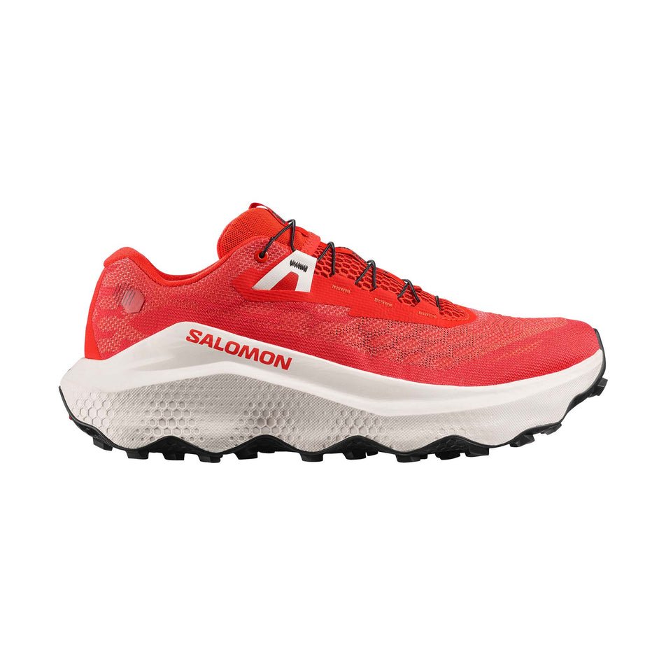 Lateral view of the right shoe from a pair of Salomon Men's Ultra Glide 4 Running Shoes in the Fiery Red/Vanilla Ice/Black colourway.