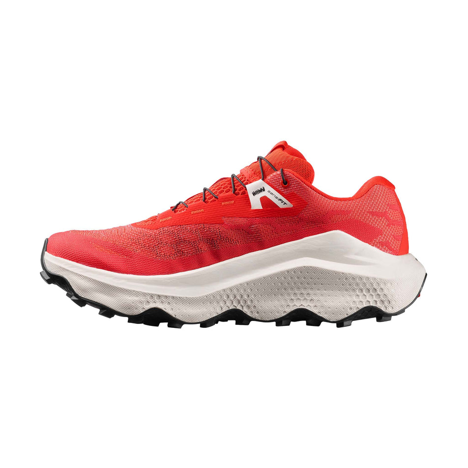 Medial view of the right shoe from a pair of Salomon Men's Ultra Glide 4 Running Shoes in the Fiery Red/Vanilla Ice/Black colourway.
