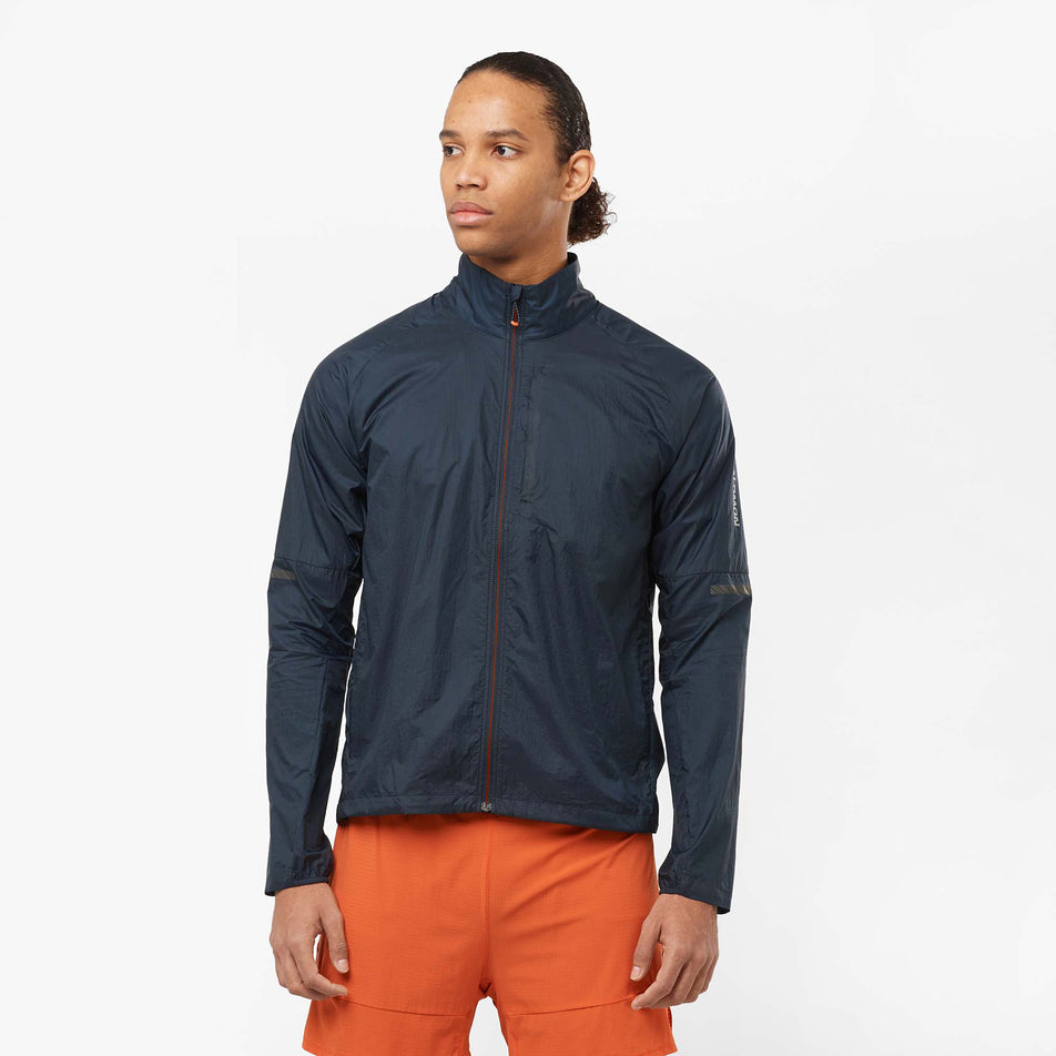 Front view of a model wearing a Salomon Men's Sense Flow Jacket in the Carbon/Carbon colourway (8071109771426)
