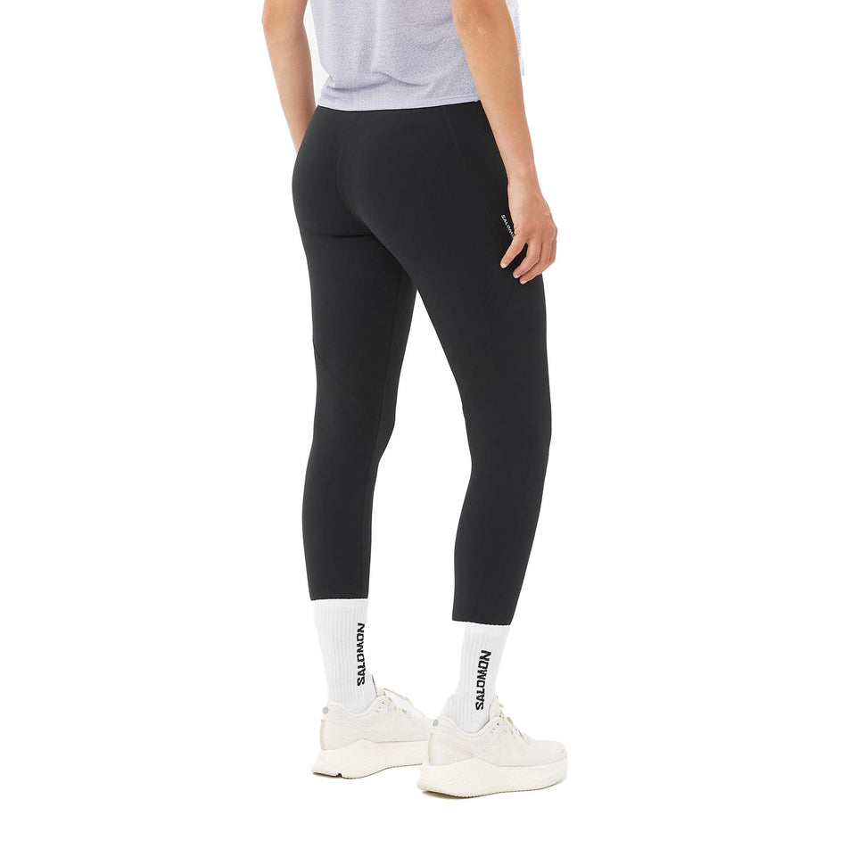 Back view of a model wearing the Salomon Women's SHKout Bliss 25