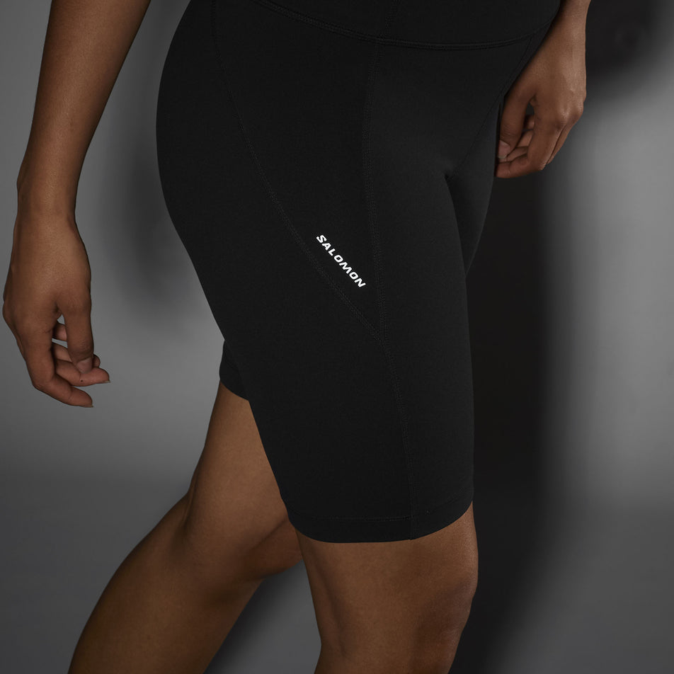 The reflective logo on the Salomon Women's SHAKEout BLISS 8