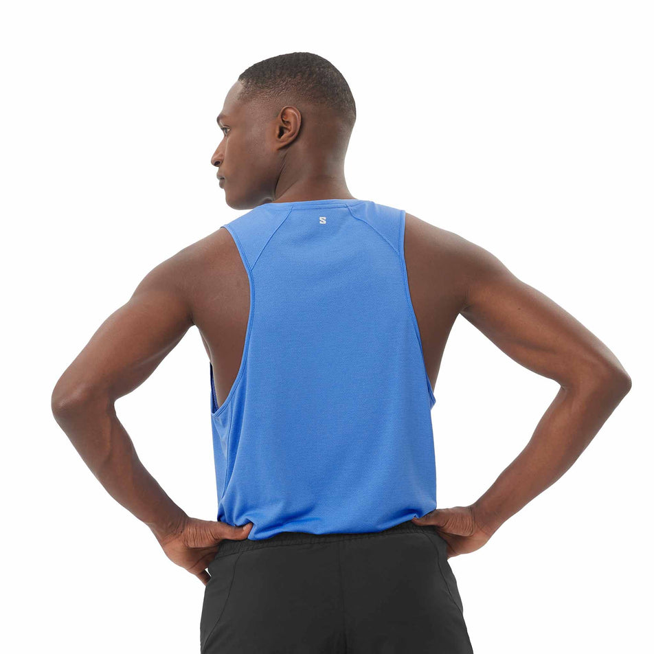 Back view of a model wearing the Salomon Men's SHKout Core Tank in the Ultramarine colourway. (8577973059746)