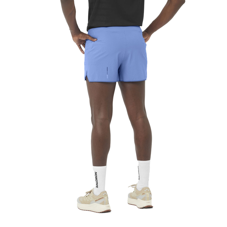 Back view of a model wearing the Salomon Men's Sense Aero 3