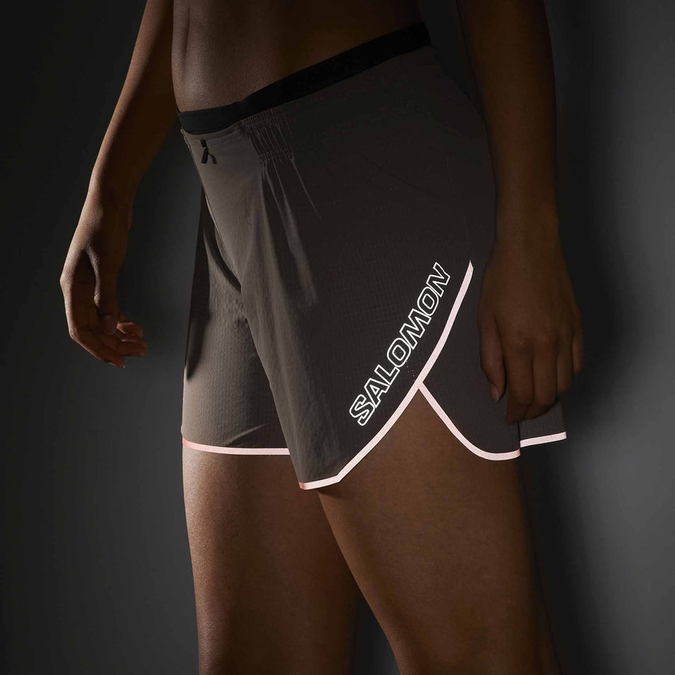 The reflective Salomon logo on the Salomon Women's Sense Aero 5