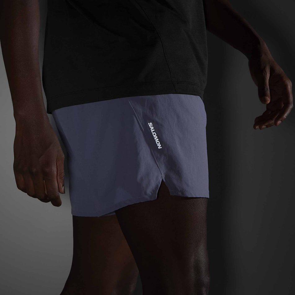 The reflective Salomon logo on the side of the Salomon Men's SHKout Core 5