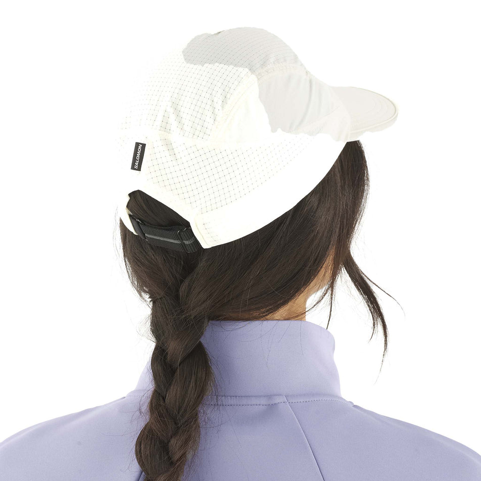 Back view of a model wearing the Salomon Unisex Sense Aero Cap in the Icicle colourway. (8575953535138)