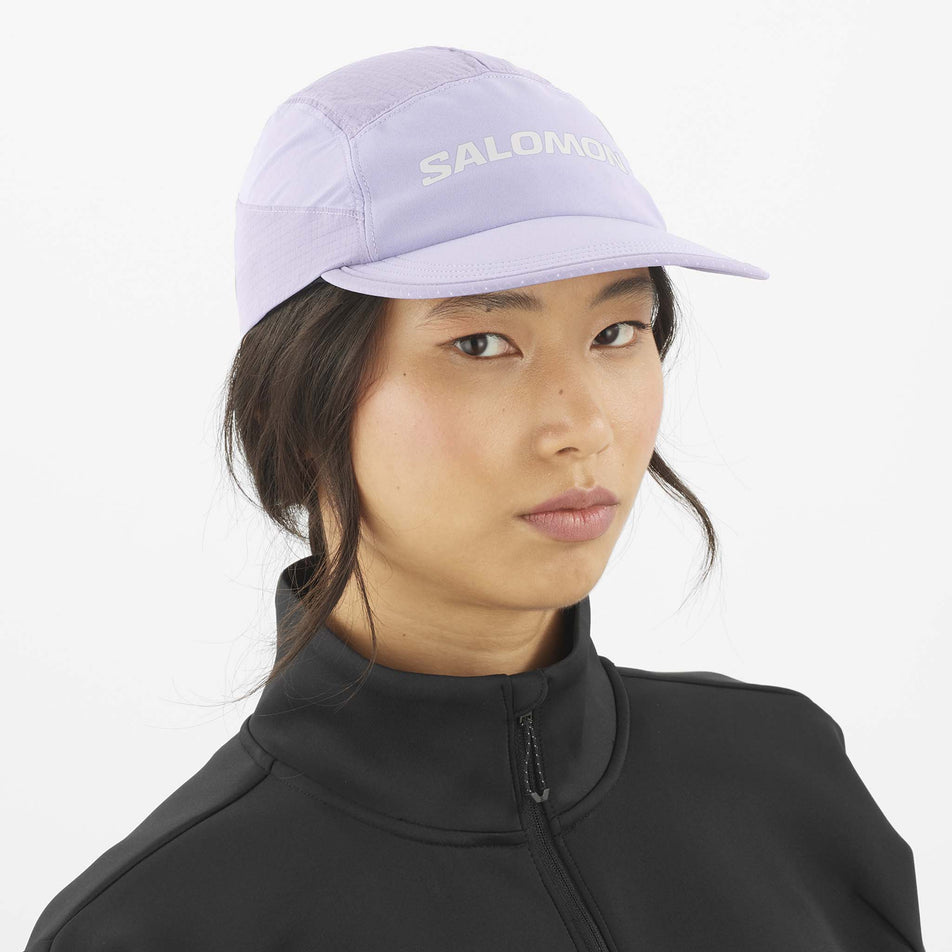 Front view of a model wearing the Salomon Unisex Aero Cap in the Cosmic Sky colourway. (8577913356450)