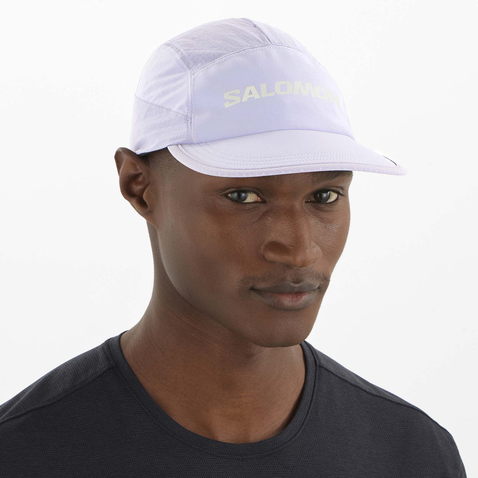 Front view of a model wearing the Salomon Unisex Aero Cap in the Cosmic Sky colourway. (8577913356450)