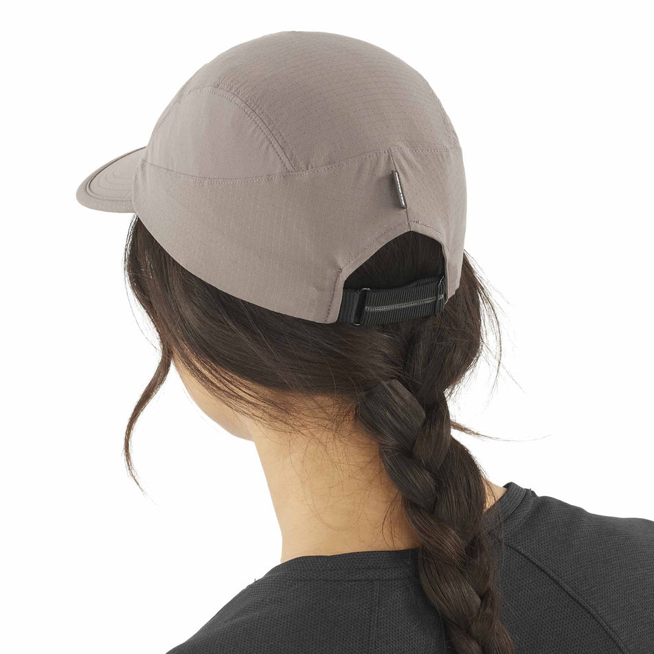 Back view of a model wearing the Salomon Unisex Sense Aero Cap in the Iron colourway. (8577886716066)