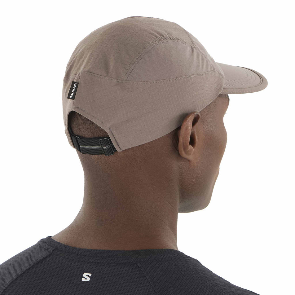 Back view of a model wearing the Salomon Unisex Sense Aero Cap in the Iron colourway. (8577886716066)