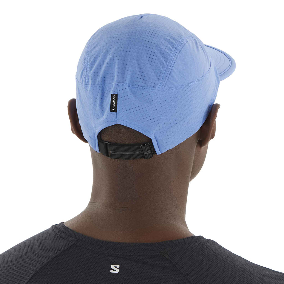 Back view of a model wearing the Salomon Unisex Sense Aero Cap in the Ultramarine colourway. (8577890877602)