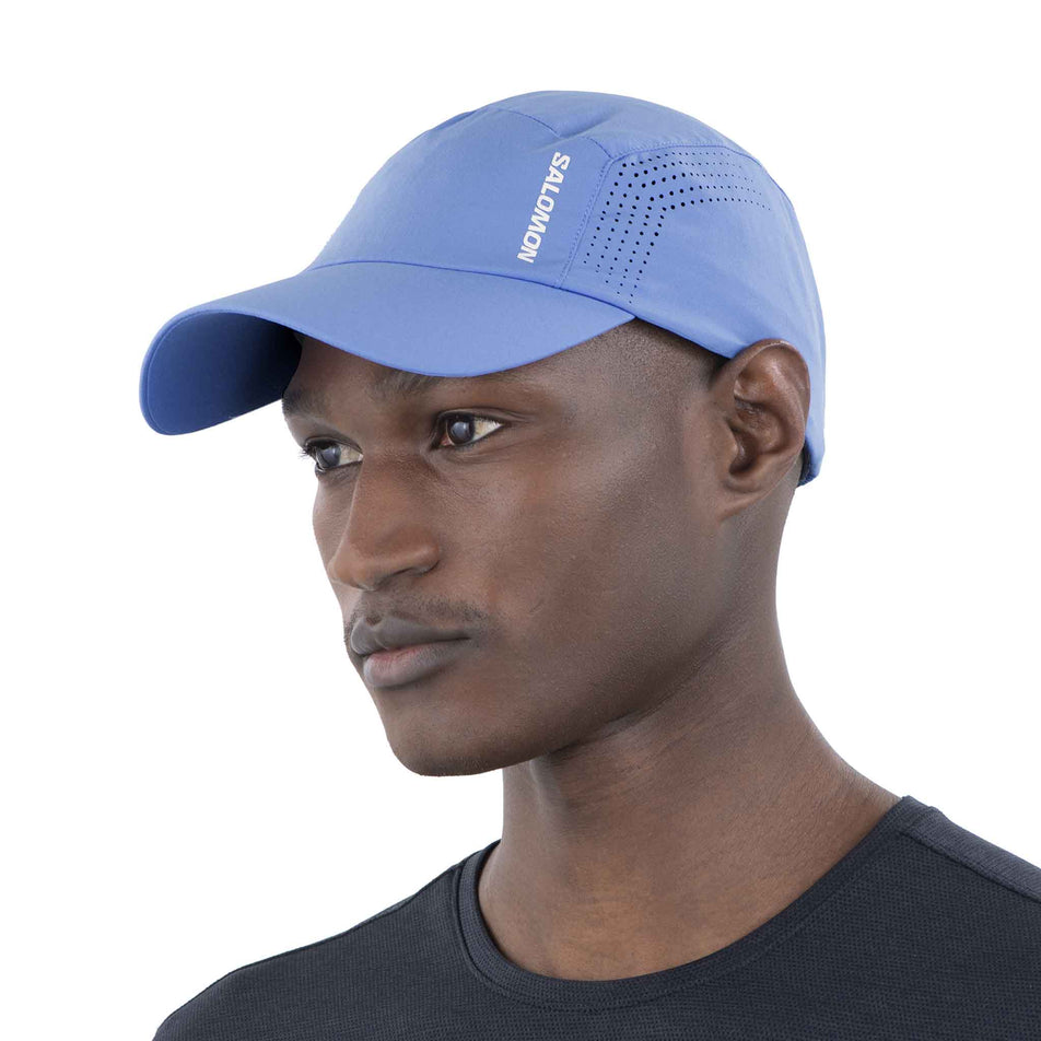 Front view of a model wearing the Salomon Unisex SHKout Cap in the Ultramarine colourway. (8577916829858)
