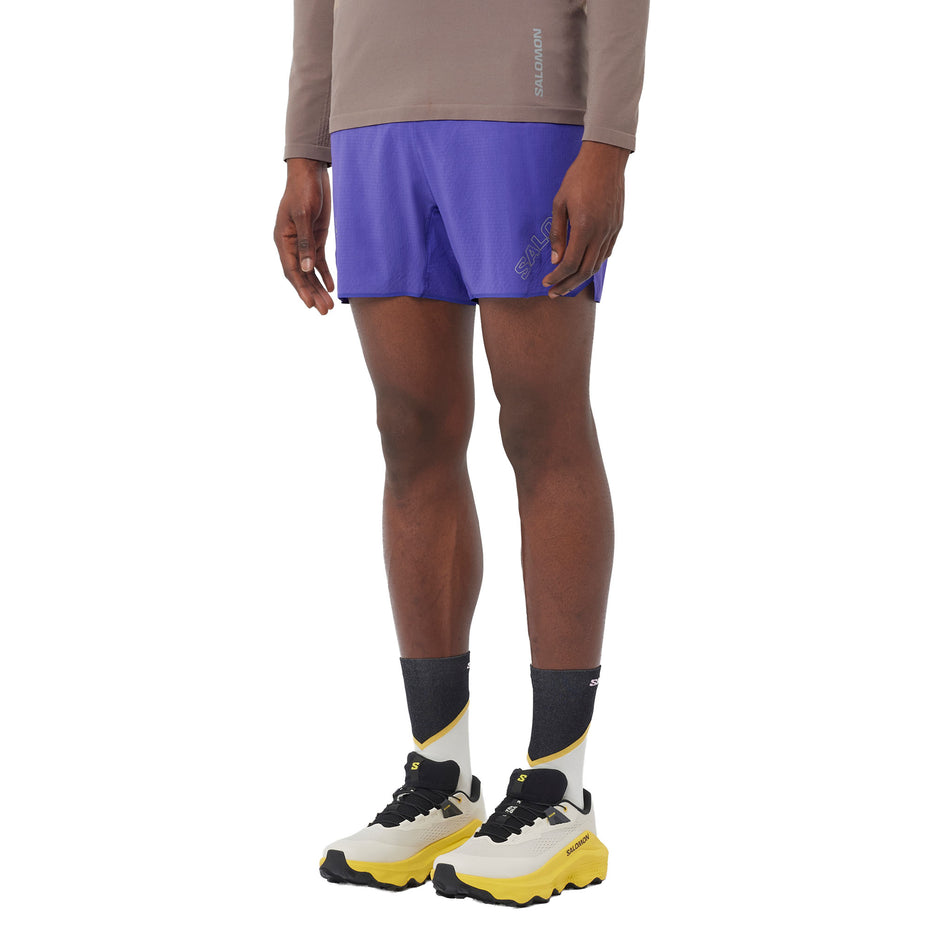 Front view of a model wearing the Salomon Men's Sense Aero 5'' Shorts in the Liberty colourway. (8736794804386)