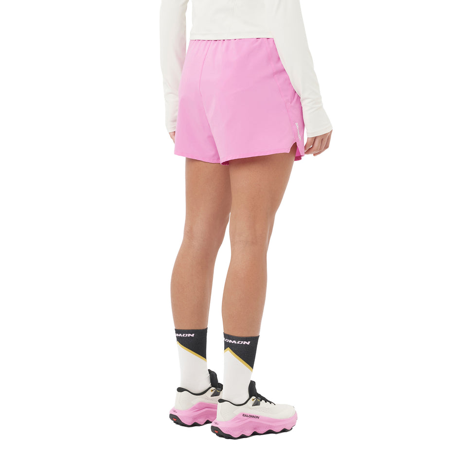 Back view of a model wearing the Salomon Women's SHAKEout Core 4