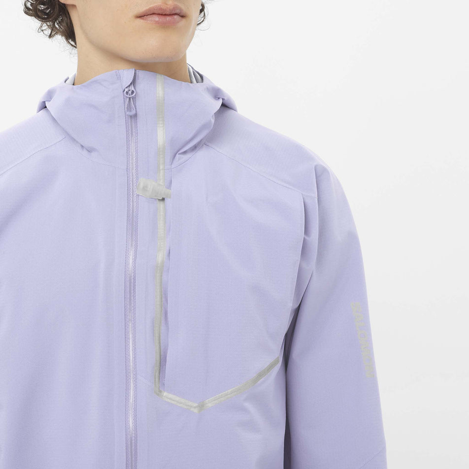 Front view of a model wearing the Salomon Men's Bonatti Trail Shell Jacket in the Cosmic Sky colourway. (8577950548130)