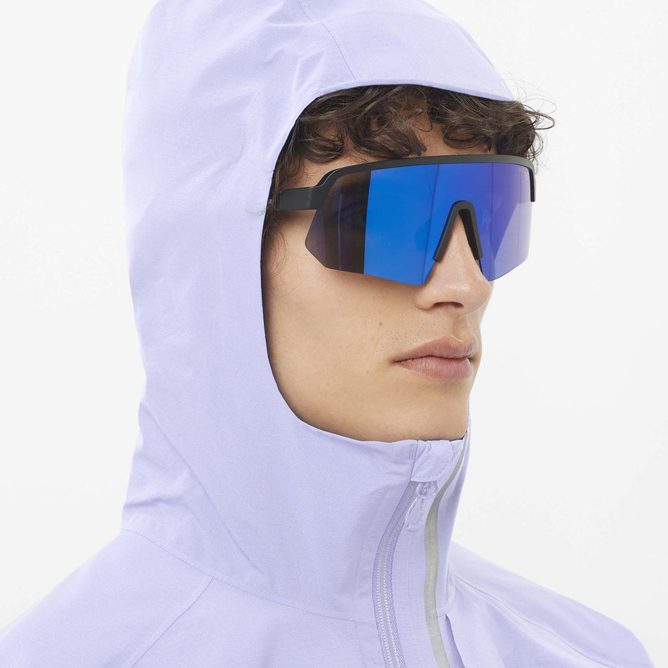 Front view of a model wearing the Salomon Men's Bonatti Trail Shell Jacket in the Cosmic Sky colourway. (8577950548130)