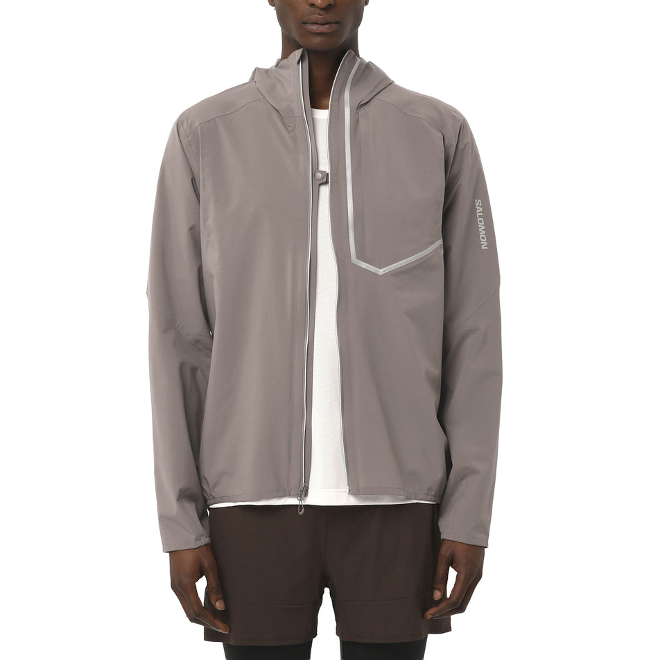 Front view of a model wearing the Salomon Men's Bonatti Trail Shell Jacket in the Iron colourway. (8736773374114)