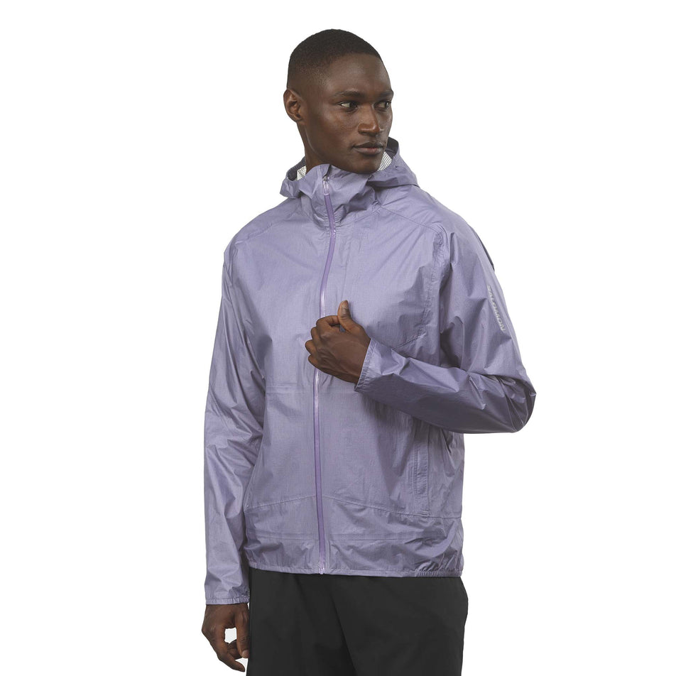 Front view of a model wearing the Salomon Men's Bonatti Waterproof Shell Jacket in the Blue Granite colourway. (8577967095970)