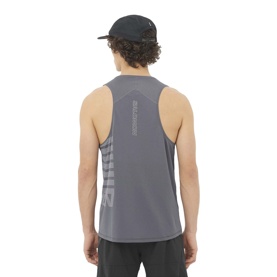 Back view of a model wearing the Salomon Men's Sense Aero Graphic Tank in the Castlerock/White colourway. (8577963032738)