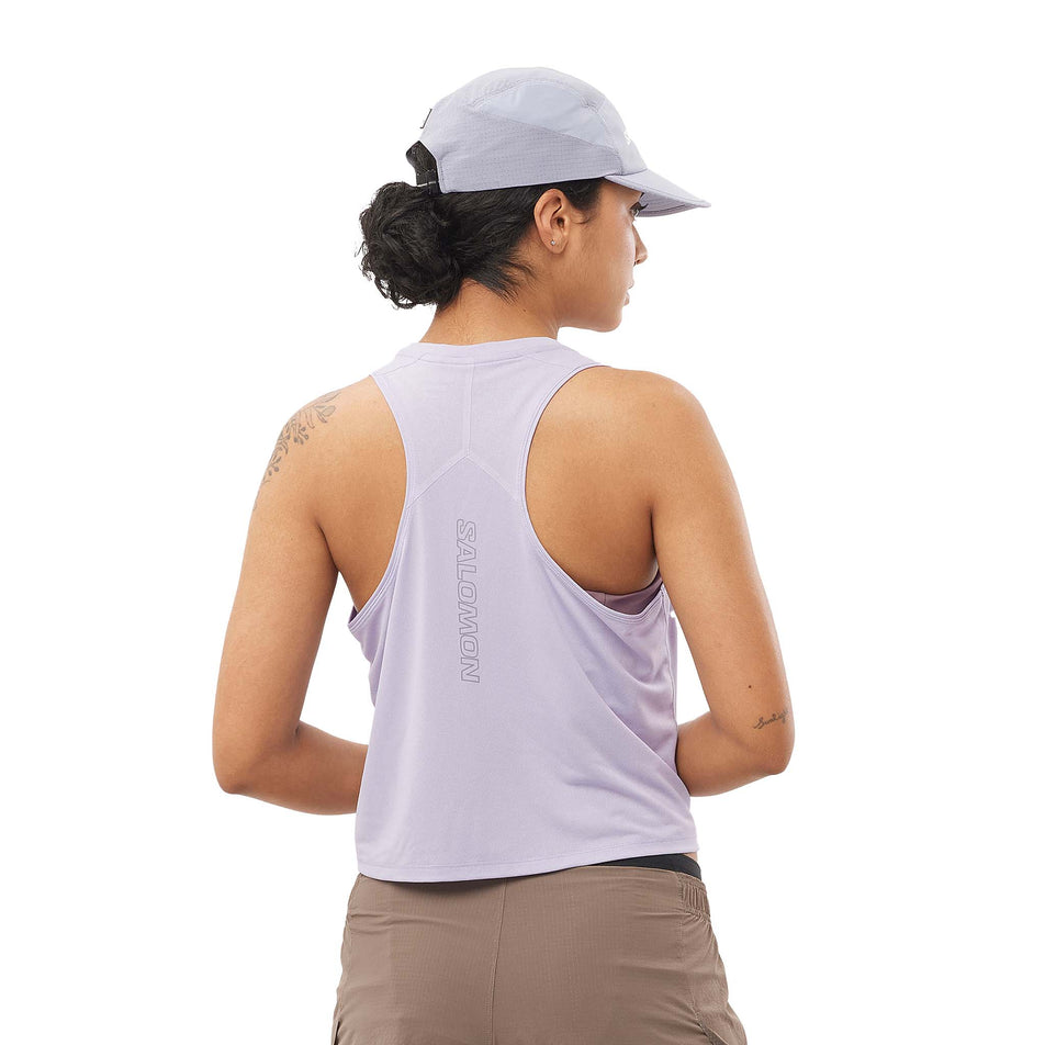 Back view of a model wearing the Salomon Women's Sense Aero Tank in the Cosmic Sky colourway. (8577401487522)