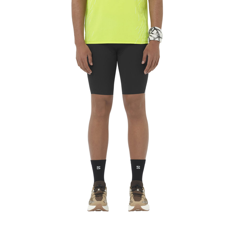 Front view of a model wearing the Salomon Men's Sense Stow Short Tights 9