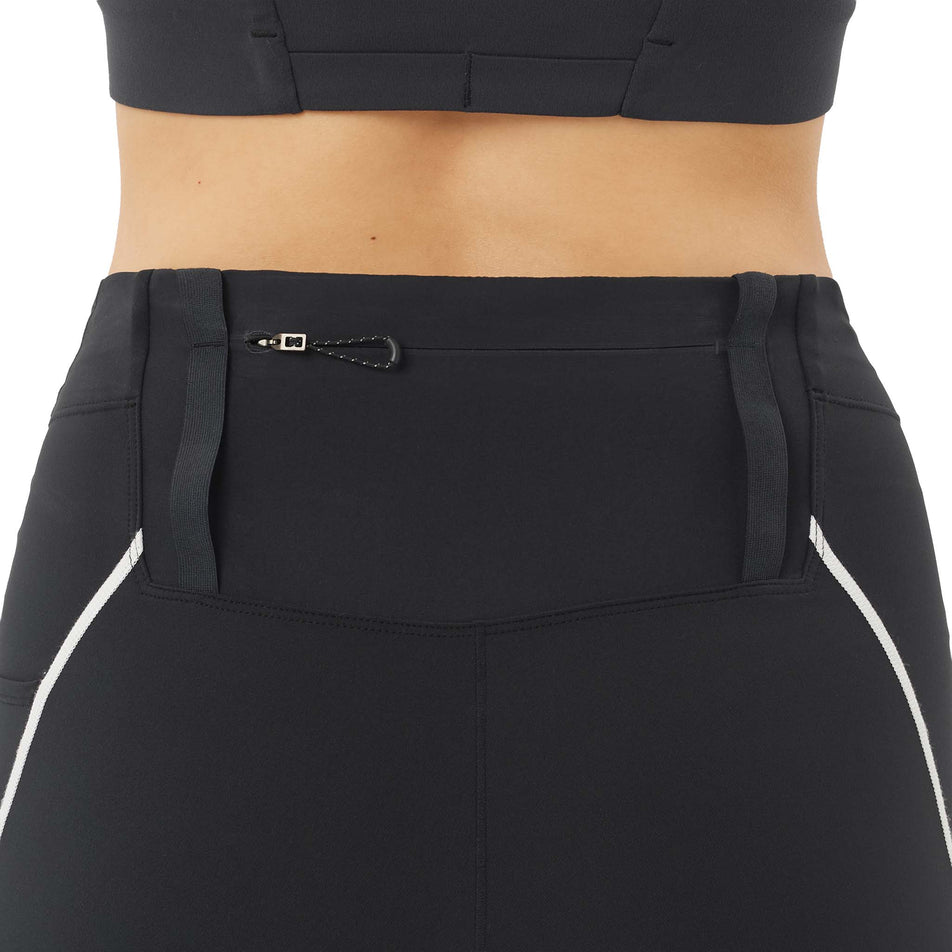 Back view of a model wearing the Salomon Women's Sense Stow Short Tights 6
