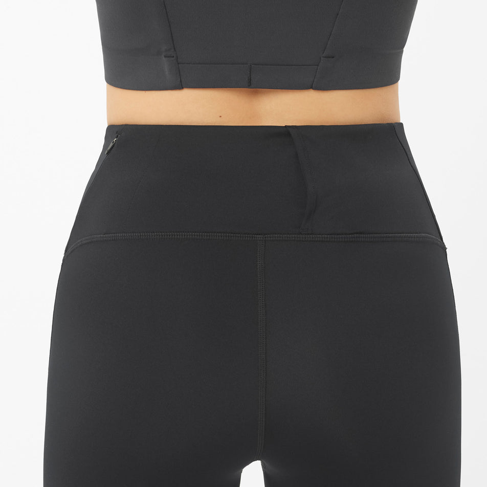 Back view of a model wearing the Salomon Women's Shakeout Core Tights 26