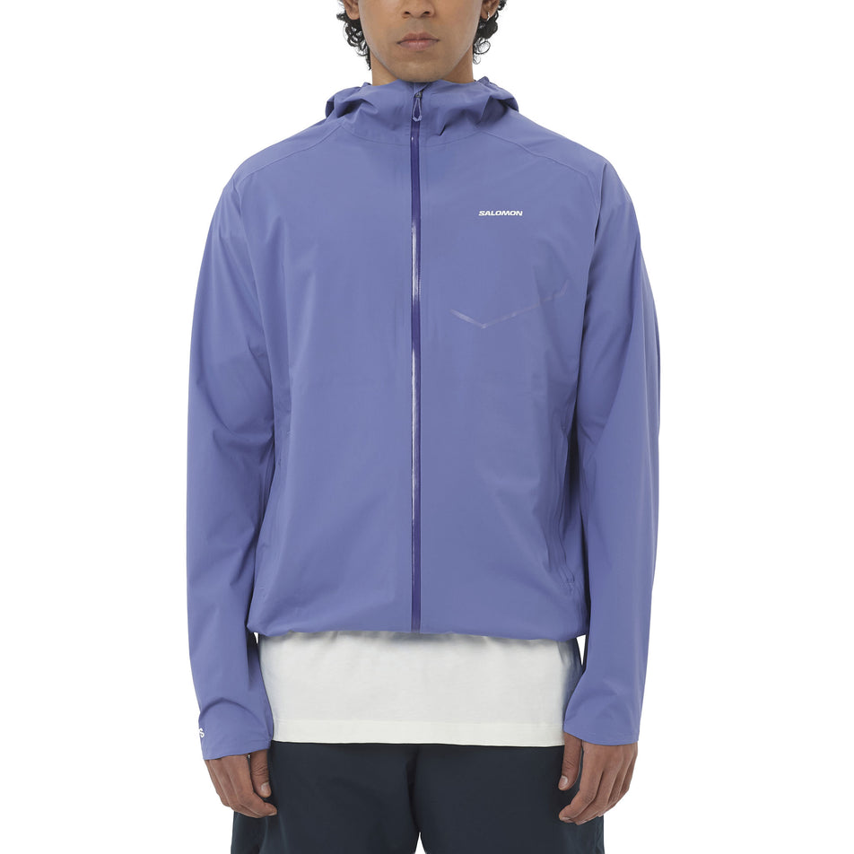 Front view of a model wearing the Salomon Men's Bonatti Waterproof Shell Jacket in the Marlin colourway.