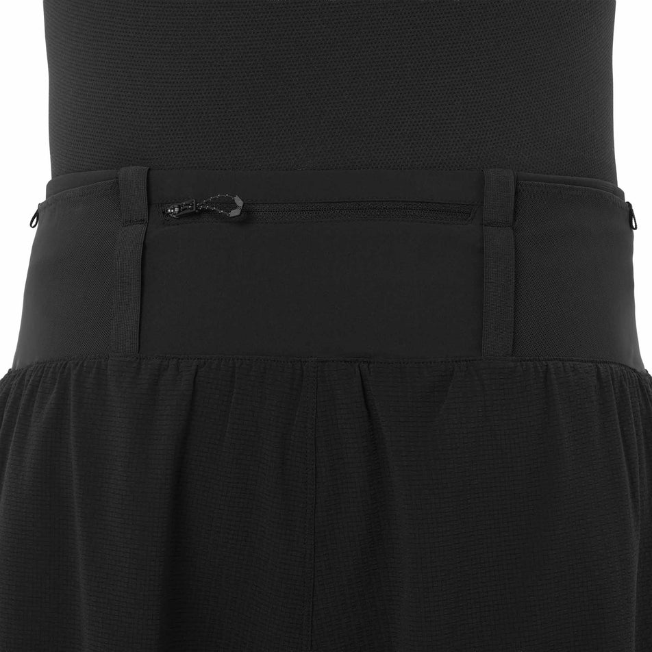 Back view of a model wearing the Salomon Men's Sense Aero 2in1 Trail Shorts 5