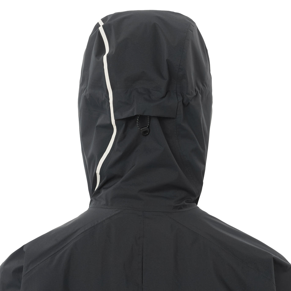 Back view of a model wearing the Salomon Women's Bonatti Pro Shell Jacket in the Deep Black colourway.