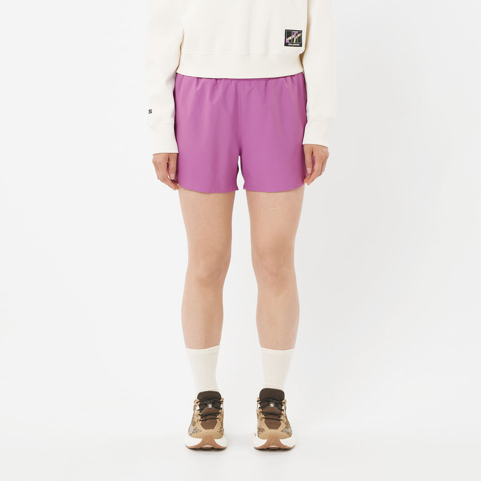 Front view of a model wearing the Salomon Women's Shakeout Core Shorts 4