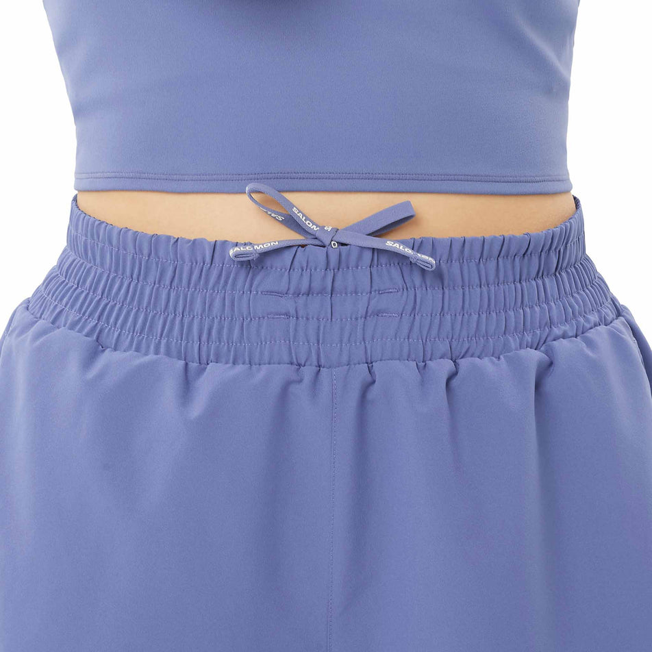 Front view of a model wearing the Salomon Women's SHKout Core Shorts 4