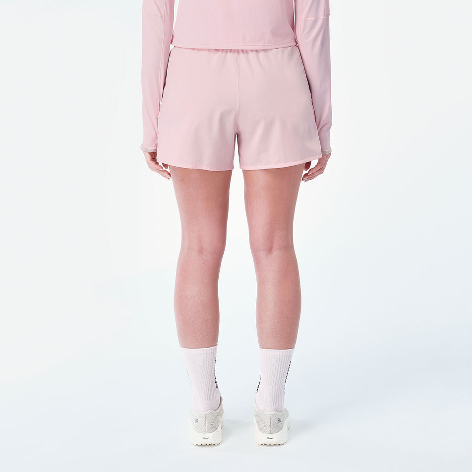 Back view of a model wearing the Salomon Women's Shakeout Core Shorts 4