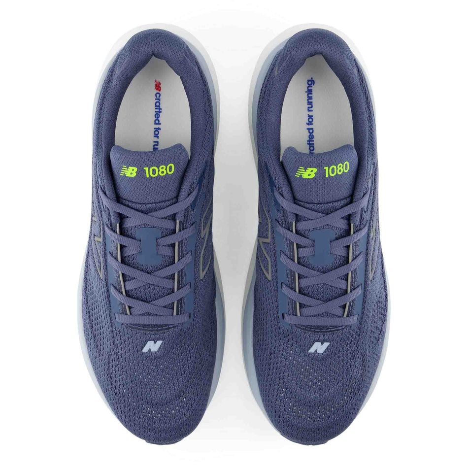 The uppers of a pair of New Balance Men's 1080 V15 Running Shoes in the Vintage Indigo colourway.
