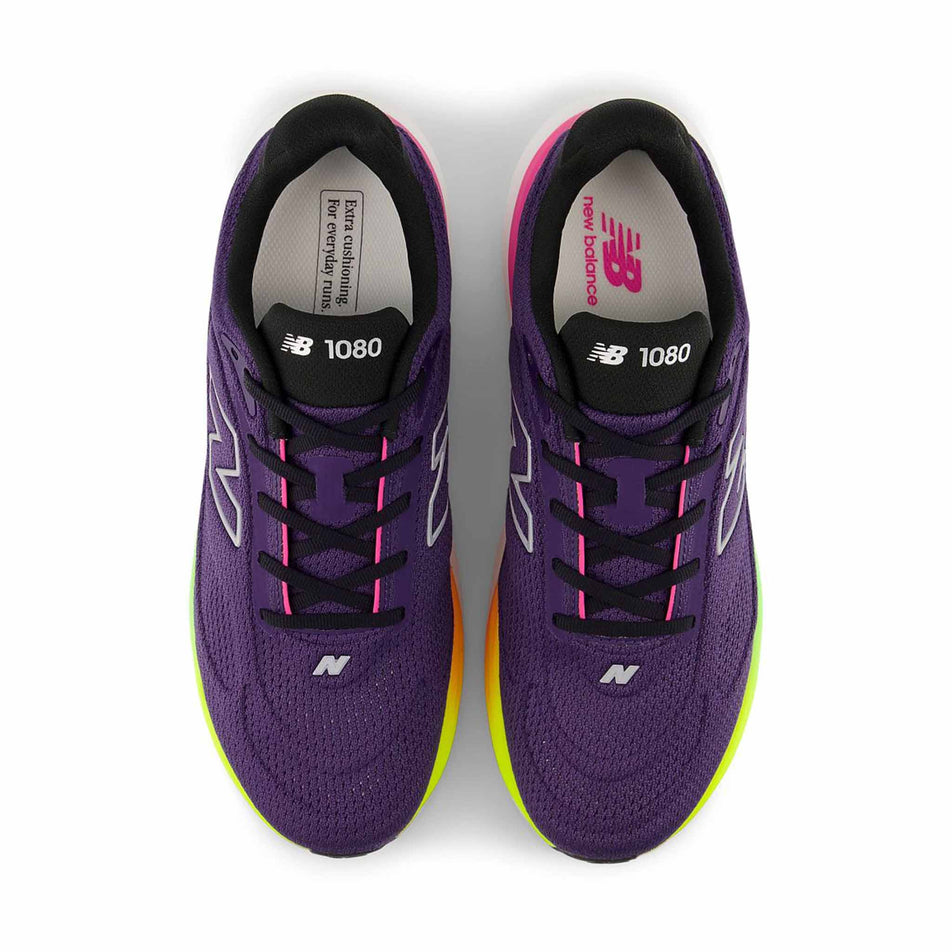 The uppers of a pair of New Balance Men's 1080 V15 Running Shoes in the Sea Salt/Silver Metallic colourway.