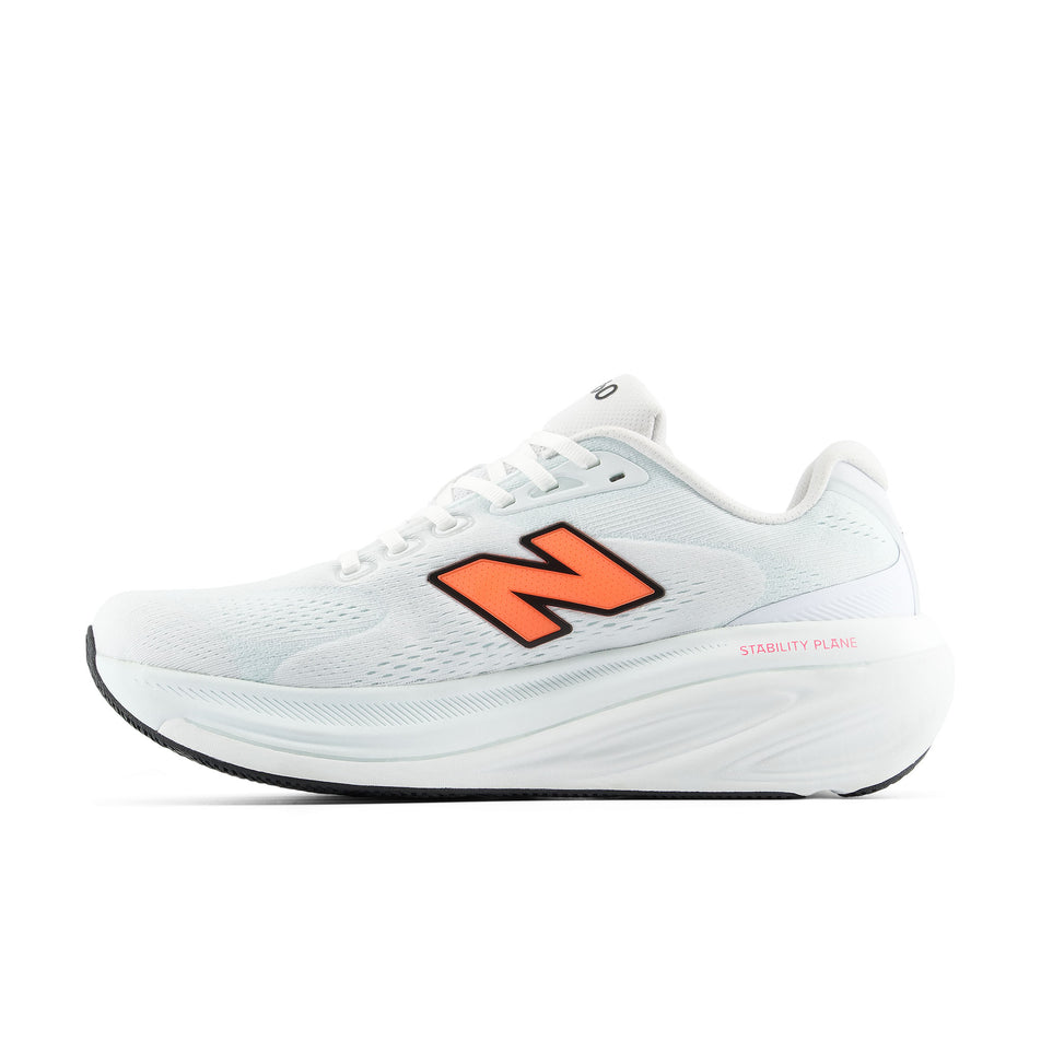 Medial view of the right shoe from a pair of New Balance Men's Fresh Foam X 860 V15 Running Shoes in the White/Tangerine Heat colourway.