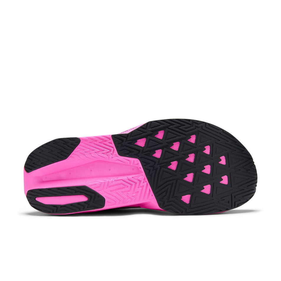 The outsole of the right shoe from a pair of New Balance Men's Fuelcell Rebel V5 Running Shoes in the Pink Heat/Rosewood colourway.