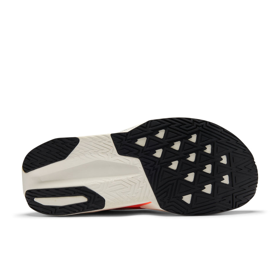 The outsole of the right shoe from a pair of New Balance Men's Fuelcell Rebel V5 Running Shoes in the Tangerine Heat colourway.