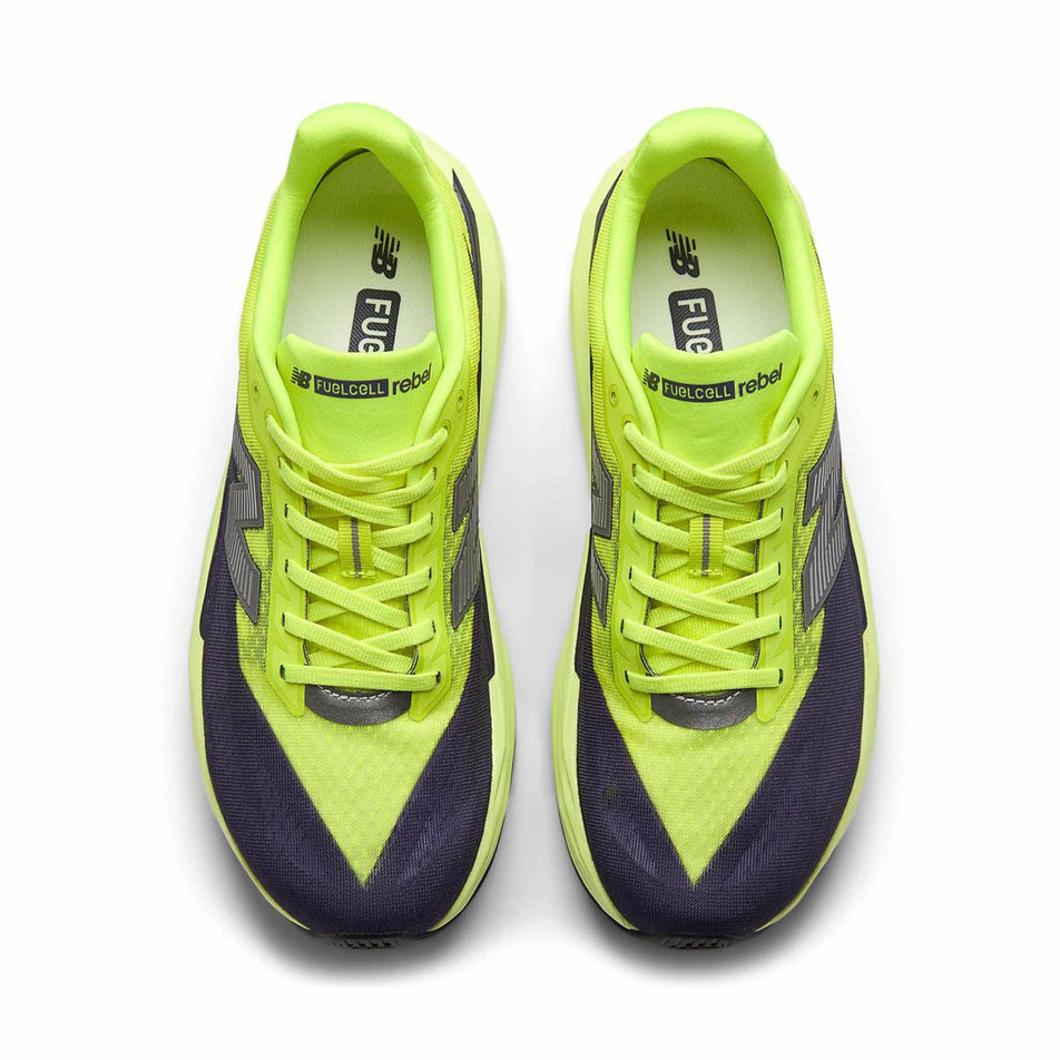 The uppers of a pair of New Balance Men's Fuelcell Rebel V5 Running Shoes in the Alkaline Green colourway.