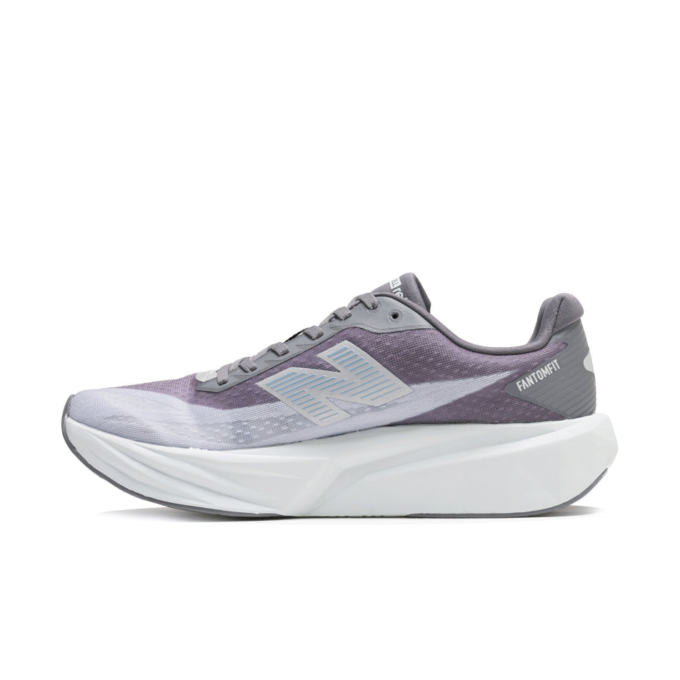Medial view of the right shoe from a pair of New Balance Men's Fuelcell Rebel V5 Running Shoes in the Magnet/Light Zinc Blue colourway.