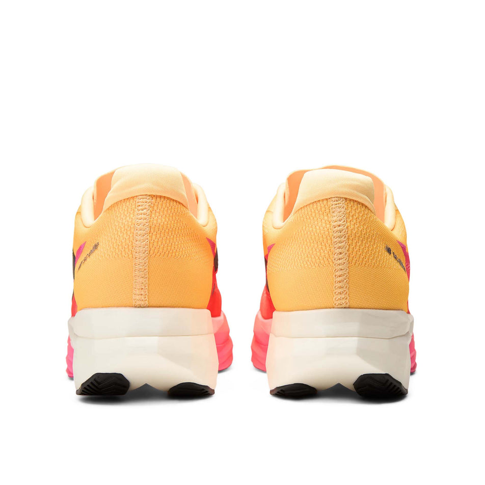 The back of a pair of New Balance Men's FuelCell SuperComp Elite V5 Running Shoes in the Tangerine Heat colourway.