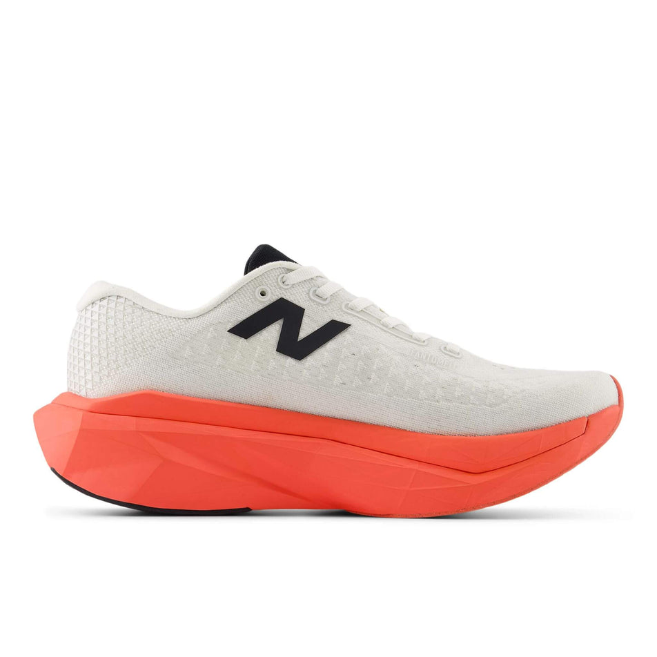 Medial view of the left shoe from a pair of New Balance Men's FuelCell SuperComp Trainer v3 Running Shoes in the Urgent Red colourway. (8713145974946)
