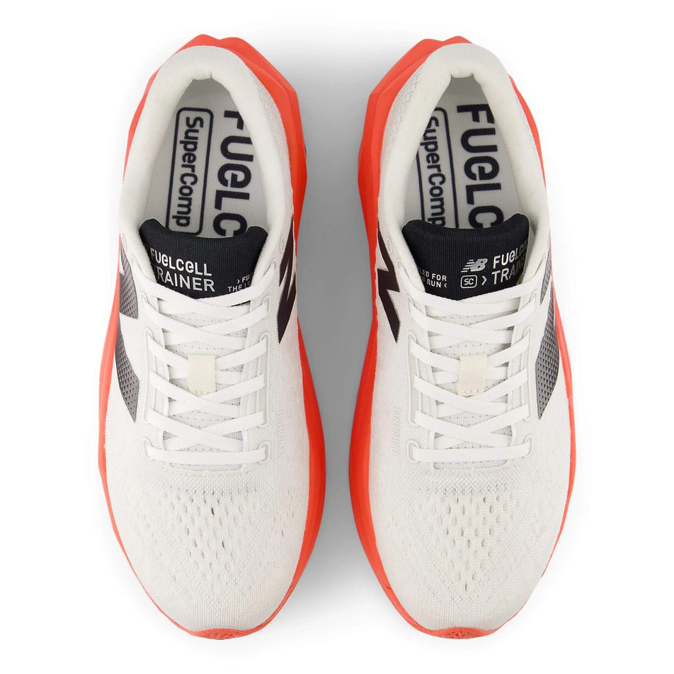 The uppers of a pair of New Balance Men's FuelCell SuperComp Trainer v3 Running Shoes in the Urgent Red colourway. (8713145974946)